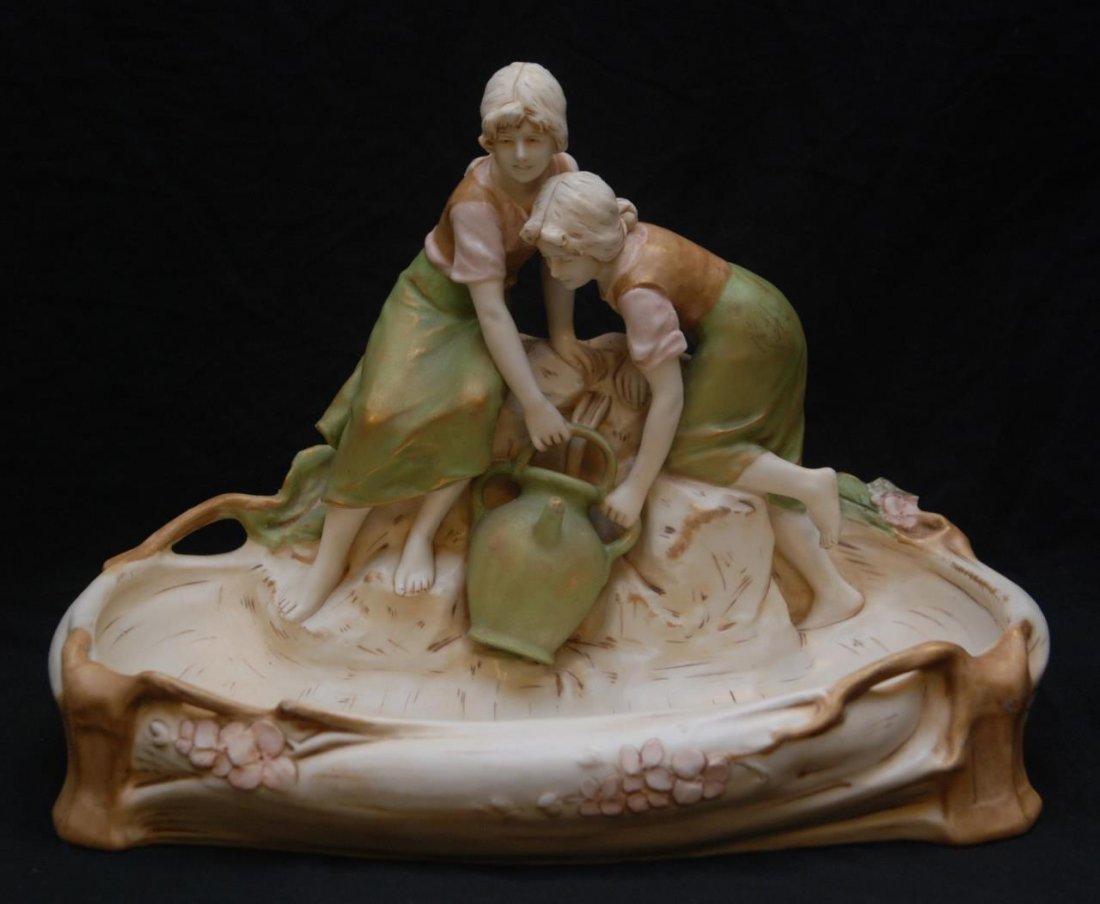 EARLY ROYAL DUX CENTERPIECE OF 2 WOMAN WITH JUG: EARLY ROYAL DUX CENTERPIECE OF 2 WOMAN WITH JUG Measures 12" tall (30.48cm) x 25" wide (63.50cm) Bears the pink triangle to base. Total weight 2212g Circa 1930's