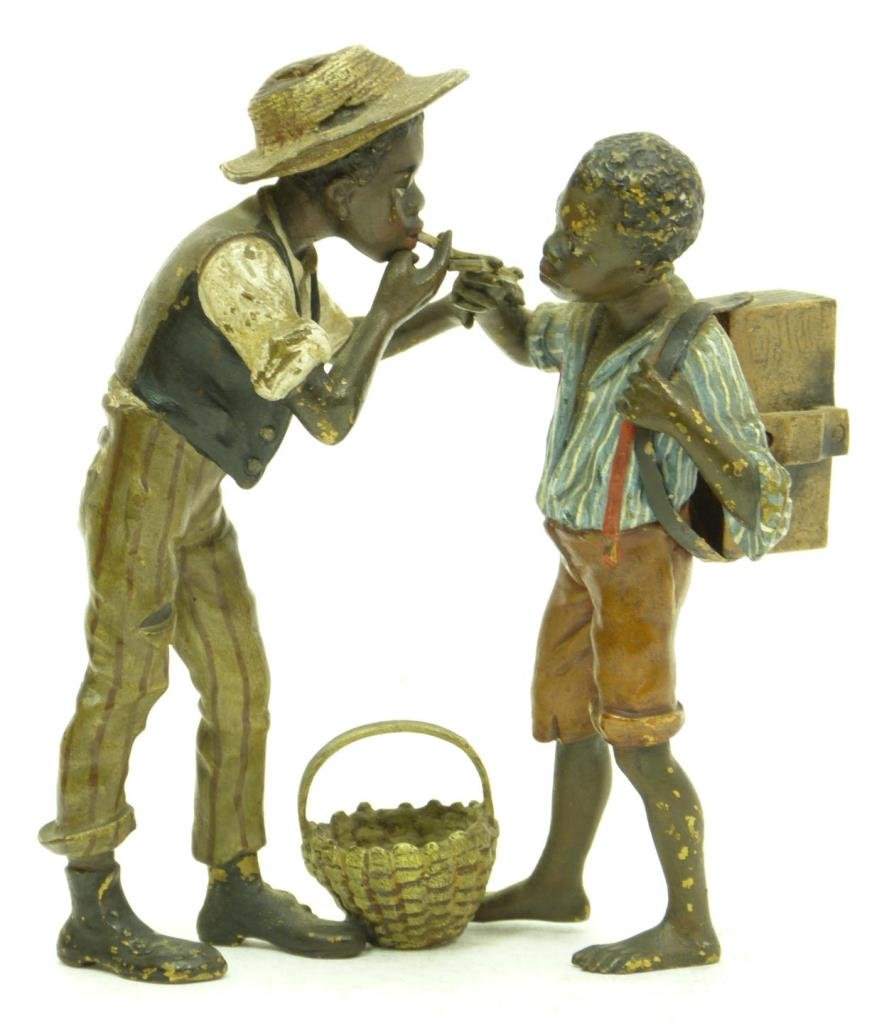 RARE BERGMAN VIENNA BRONZE: RARE BERGMAN VIENNA BRONZE 2 black boys lighting cigarettes. Signed Bergman & Gesschutz. Measures 4" tall (10.16cm). Total weight 440g