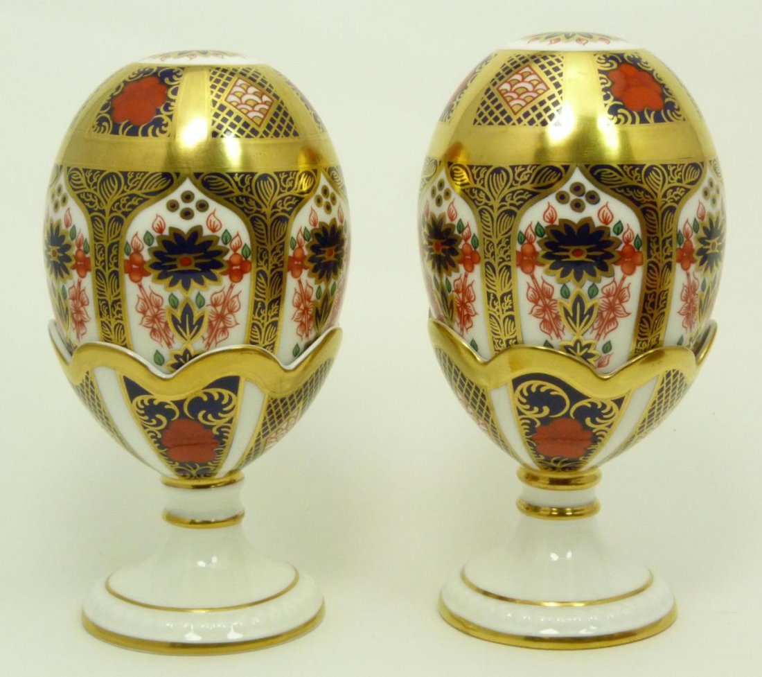 2 ROYAL CROWN DERBY PORCELAIN EGGS & HOLDER: 2 ROYAL CROWN DERBY PORCELAIN EGGS & HOLDER Imari pattern. One comes with original box. They measure 6" tall (15.4cm). Signed Royal Crown Derby. Total weight 325g