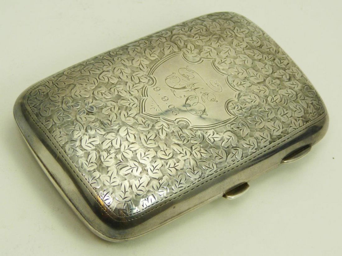 VINTAGE ENGLISH SILVER CIGAR CASE: VINTAGE ENGLISH SILVER CIGAR CASE Monogrammed and dated. English silver hallmarks to inside of case, S.M.L makers mark. Measures 4-3/4" long (12.06cm) x 3-1/8" wide (7.93cm). Total weight 136.6g