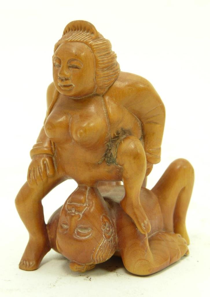 CARVED 2PC EROTIC NETSUKE: CARVED 2PC EROTIC NETSUKE Finely carved erotic netsuke with magnificent details of 2 lovers. Measures 2-1/2" tall (6.35cm) x 1-1/2" wide (3.81cm) x 1-3/4" depth (4.44cm). Total weight 32.5g
