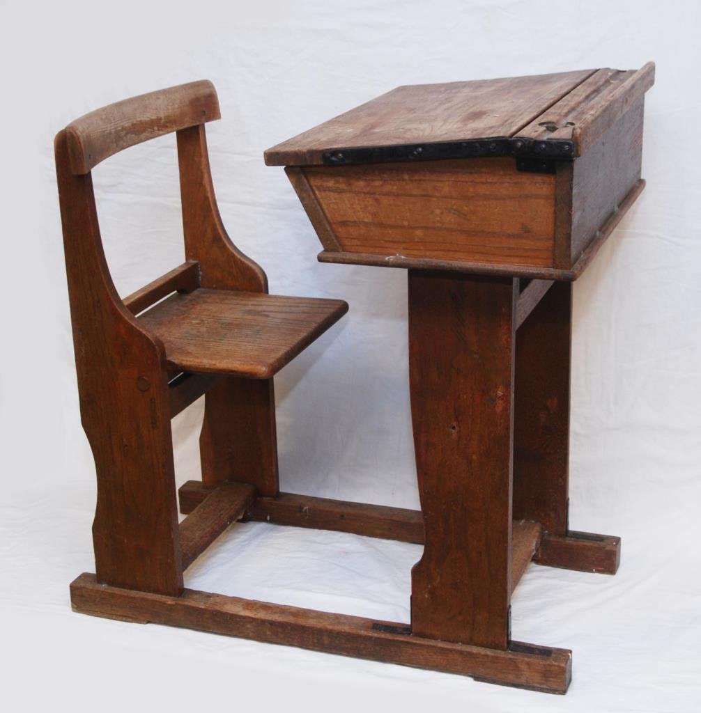 RARE ANTIQUE RUSTIC LIFT TOP OAK SCHOOL DESK: RARE ANTIQUE RUSTIC LIFT TOP OAK SCHOOL DESK Lift top with inkwell to top right corner, seat flips to open or close. Overall dimensions 33-1/2" tall (85.09cm) x 22-1/2" wide (55.88cm) x 33" depth (83.