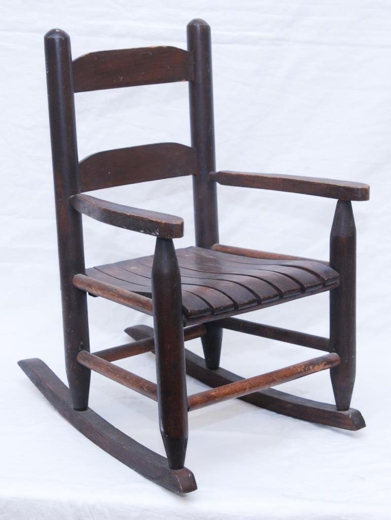 VINTAGE CHILDS WOODEN ROCKING CHAIR: VINTAGE CHILDS WOODEN ROCKING CHAIR Measures 15" wide (38.1cm) x 23-1/2" tall (59.69cm) x 13" depth (33.02cm). 19th/20th century.