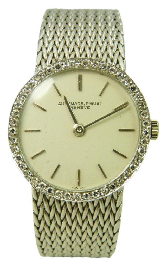 VINTAGE AUDEMARS PIGUET 18KT GOLD & DIAMOND WATCH: VINTAGE AUDEMARS PIGUET 18KT GOLD & DIAMOND WATCH Swiss watch by one of the foremost makers in the world Audemars Piguet. Approx 6-1/2" long (16.51cm) with 48 small round cut diamonds, 18kt white gold