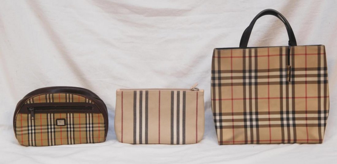 LOT OF 3 BURBERRYS PURSES: LOT OF 3 BURBERRYS PURSES Tallest being 15" tall (38.1cm) x 12-1/2" wide (31.75cm) tote bag plus 2 cosmetic case/ makeup bags. Total weight 733.6g