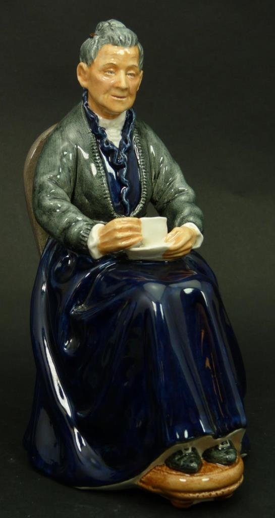 ROYAL DOULTON PORCELAIN FIGURINE OF CUP OF TEA: ROYAL DOULTON PORCELAIN FIGURINE OF CUP OF TEA HN2322. Measures 7" tall (17.78cm) Total weight 370g