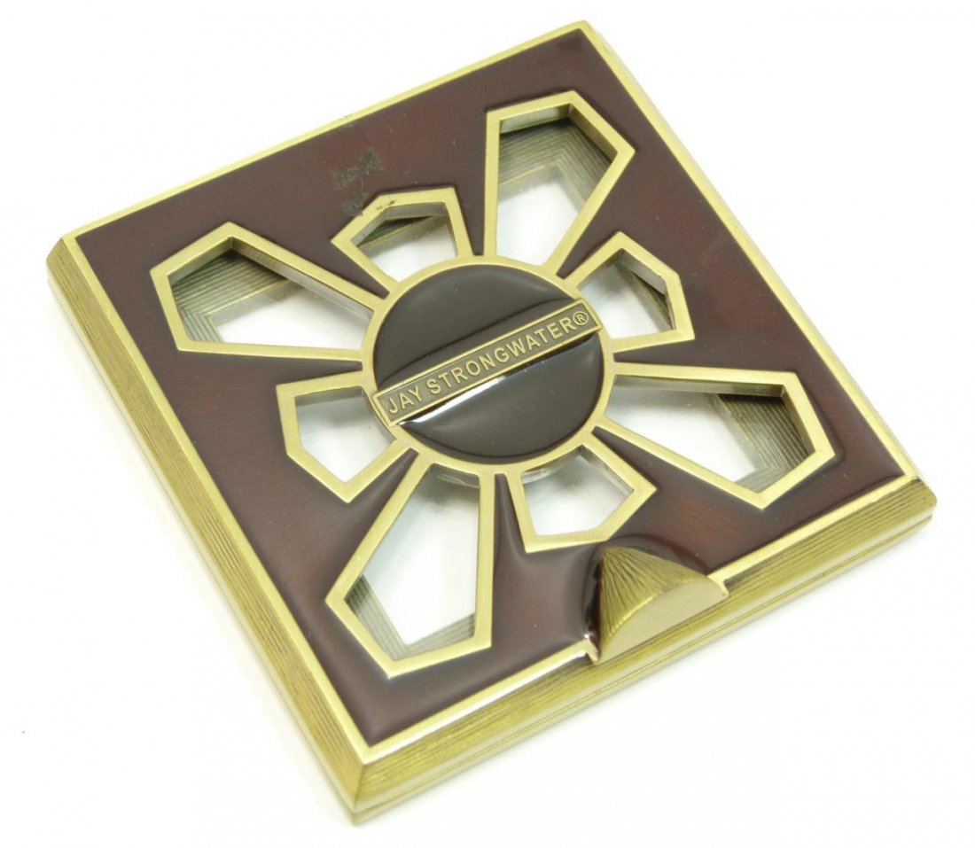 JAY STRONGWATER ENAMEL & JEWELED PICTURE FRAME: JAY STRONGWATER ENAMEL & JEWELED PICTURE FRAME Signed Jay Strongwater. Holds a 2 x 2 picture (5.08cm). Total measurement of frame 2-3/4" square (6.98cm). Comes in original pouch. Total weight 181g