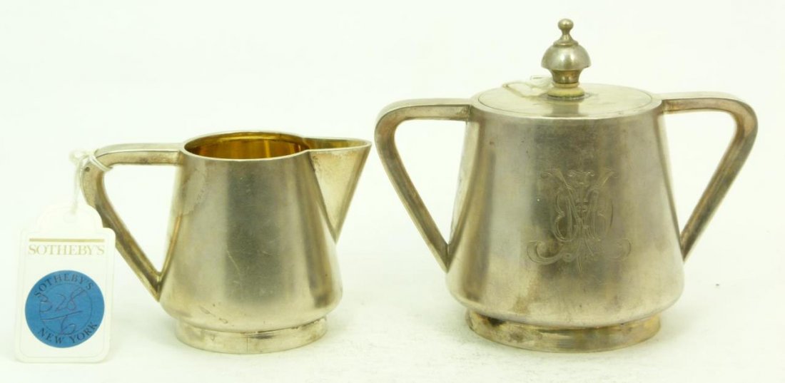 IMPORTANT RUSSIAN SILVER CREAMER & SUGAR: IMPORTANT RUSSIAN SILVER CREAMER & SUGAR Bears Sotheby label from 1894. Measures 4-1/2" tall (11.43cm) (sugar), Total weight 16.25ozt