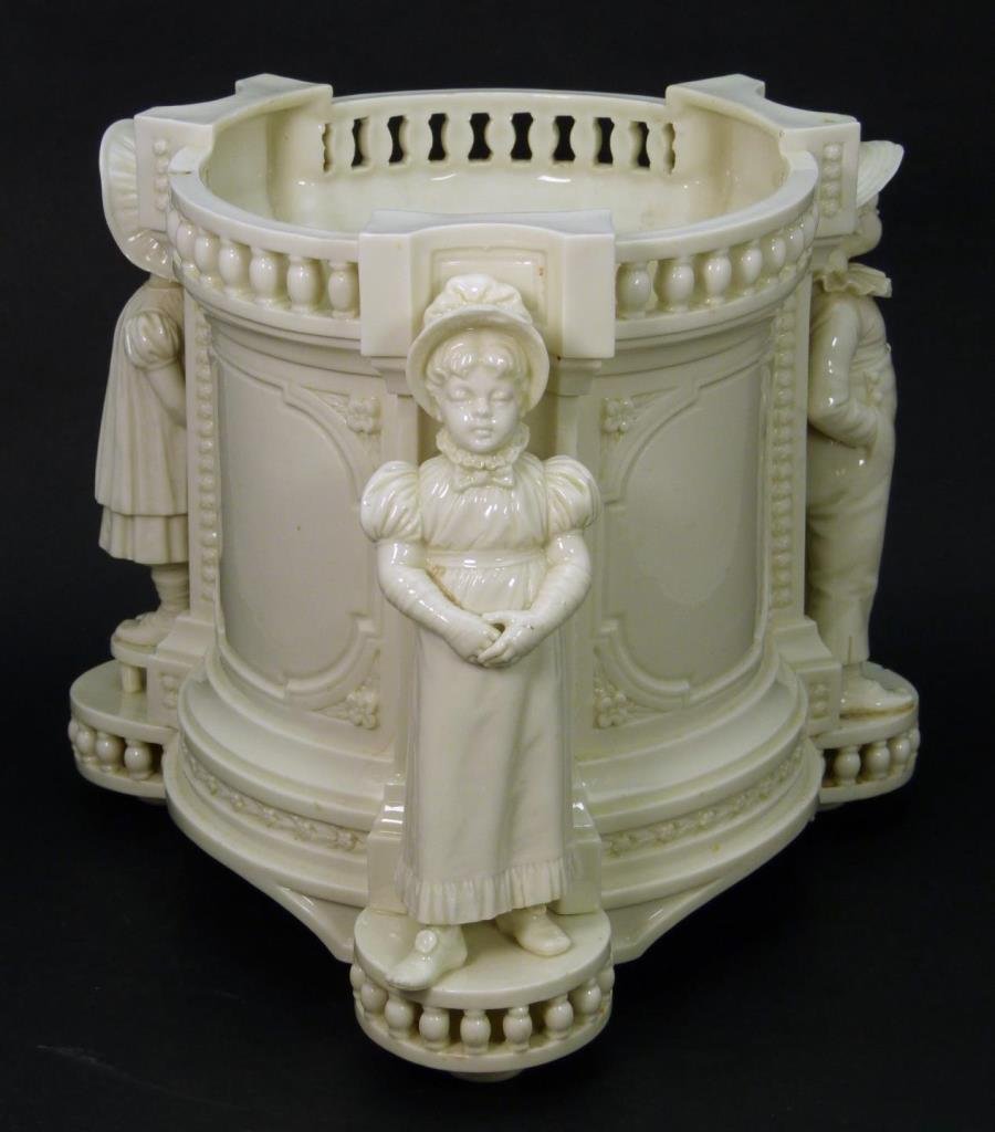 19TH C ROYAL WORCESTER LARGE BLANC DE CHINE POT: 19TH CENTURY ROYAL WORCESTER LARGE BLANC DE CHINE FIGURAL CENTER POT Measures 8-1/2" tall (21.59cm) x 8-1/2" wide (21.59cm). Blanc de Chine with 3 young children adorning the side of the pot. Incised 