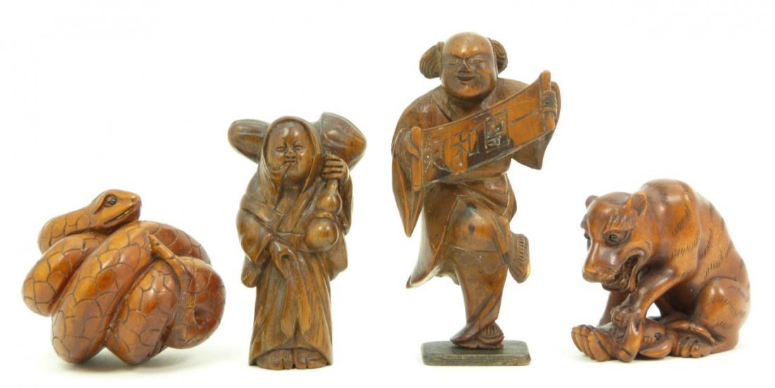 4 ANTIQUE CARVED CHINESE WOODEN NETSUKE: 4 ANTIQUE CARVED CHINESE WOODEN NETSUKE Each approx 2-1/2" tall (6.35cm). One depicting a scholar, tiger, snake and last a basket seller. Total weight 94g