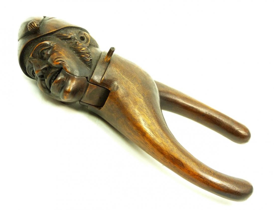 BLACK FOREST CARVED WOODEN NUT CRACKER: BLACK FOREST CARVED WOODEN NUT CRACKER Measures 9" (22.86cm) long, with a total weight of 169