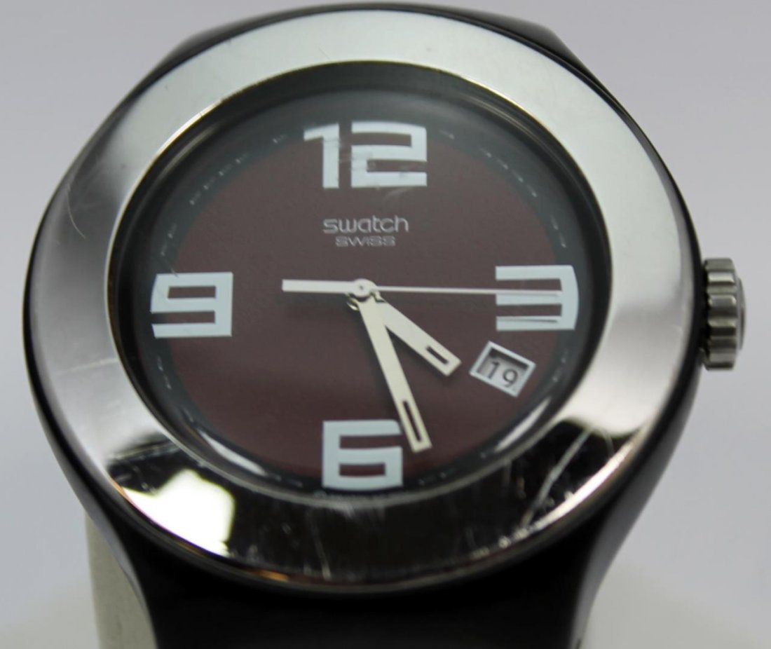SWATCH IRONY BIG CASE STAINLESS COLORED WATCH: A Swatch Denmark 'Irony' large case watch having a black colored design and red & black two tone leather band. Sub date meter.