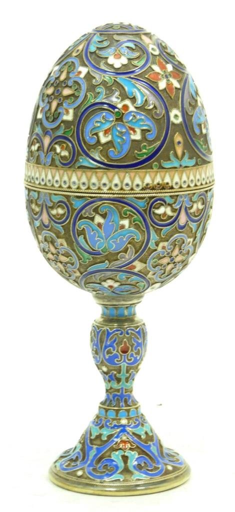 RUSSIAN ENAMEL & SILVER FOOTED EGG: Russian enamel and silver footed egg. Measures 6" (15.24cm) Height. Total weight 5.5ozt