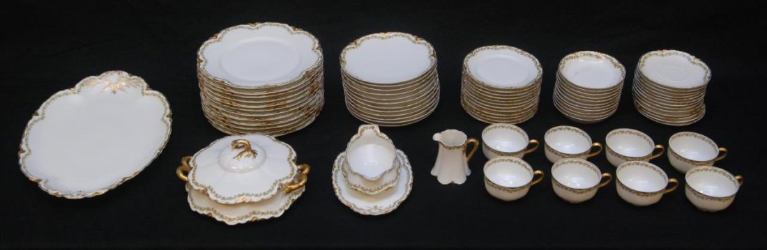 HAVILAND LIMOGES FRANCE 72 PIECE DINNER SET: Haviland Limoges France 72 piece dinner set consisting of 12 dinner plates, 12 salad plates, 12 bread plates, 11 desert dishes, 13 saucers, 8 cups, a creamer, a covered casserole, large serving plate 