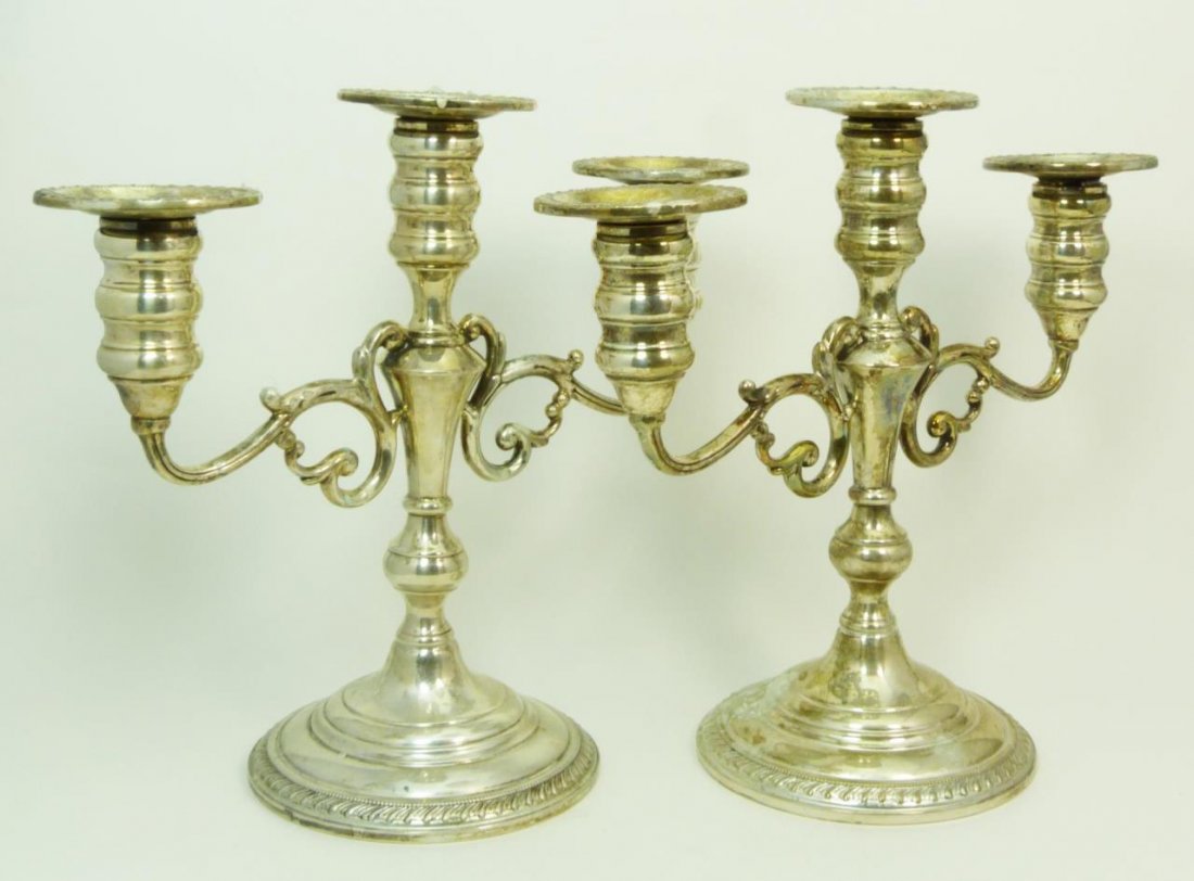 PAIR OF VINTAGE STERLING TWO ARMED CANDELABRAS: Pair of vintage sterling silver two armed candelabras. Please note these are filled to base. Each measures 9 1/4" (23.49cm) Height. Total weight 1.8kg.