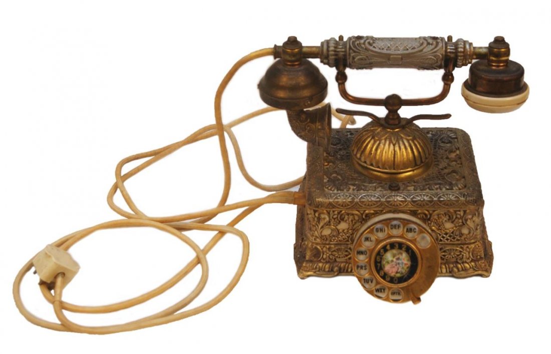 VINTAGE CONTINENTAL HOTEL LOBBY TELEPHONE: Vintage continental hotel lobby telephone with all ornate ormolu brass. Measures 10" (25.40cm) Width x 9" (22.86cm) Height. Total weight 7lbs.