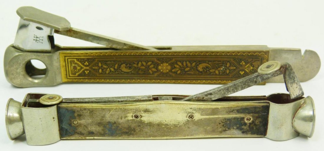 TWO LARGE ANTIQUE CIGAR CUTTERS: Two large antique cigar cutters. Longest measures approx 6" (15.24cm) Length. Total approx weight 194g.