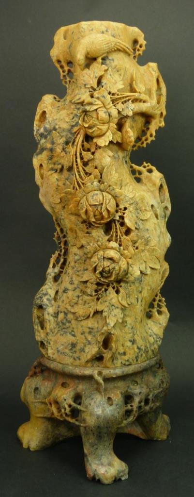 ANTIQUE CHINESE LARGE CARVED SOAPSTONE VASE: Antique Chinese intricately carved soapstone vase depicting birds with peony blooms. Birds and flowers in relief. Sits on a 4 leg base. Late 19th to early 20th century. Measures approx 16" (40.64cm) H