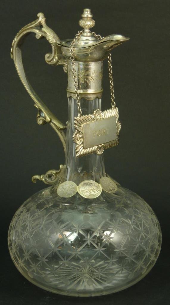 VINTAGE CRYSTAL CLARET w/ SILVER PLATED TOP: Vintage crystal claret with a silver plated top with port wine sign. Measures approx 9 1/2" (24.13cm) Height. Total approx weight 804g. Provenance: From the estate of Count Adrian Toati de Suiza de Bo