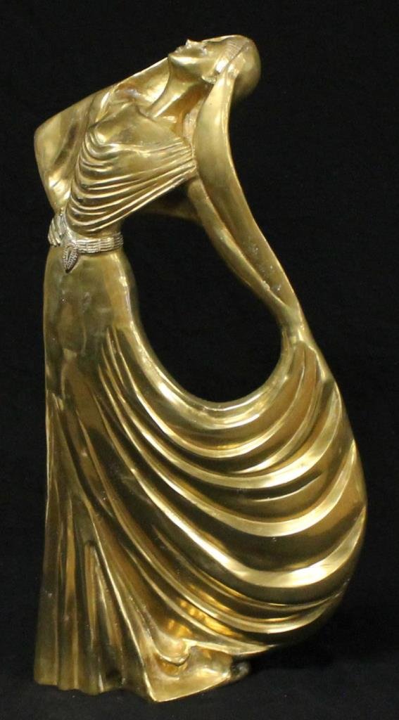 ART DECO BRONZE SCULPTURE OF A DANCING WOMAN: Art Deco bronze sculpture of a dancing woman. No apparent signature. Measures approx 21 1/2" (54.61cm) Height. Total approx weight 15lbs. Provenance: From the estate of Count Adrian Toati de Suiza de 