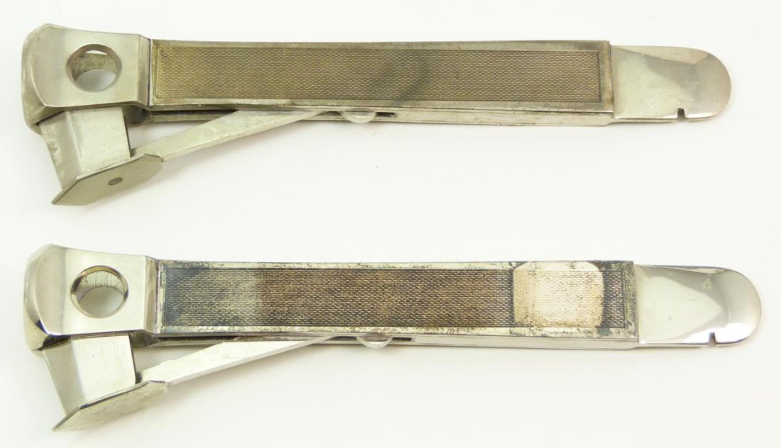 PR OF SOLINGEN ANTIQUE STERLING CIGAR CUTTERS: Pair of Solingen antique sterling silver cigar cutters. Dates from the mid century. Each measures 6" (15.24cm) Length. Total approx weight 8ozt.