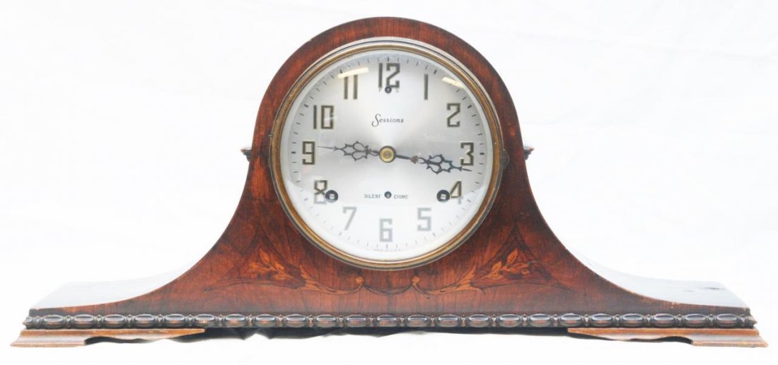 ANTIQUE SESSIONS WOODEN MANTLE CLOCK: Antique Sessions wooden inlaid mantle clock. Dates to the turn of the century. Measures 21" (53.34cm) Width x 9 1/2" (24.13cm) Height. Total approx weight 6lbs.