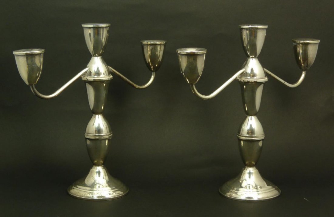 PAIR STERLING SILVER TWO ARM CANDELABRA: Pair of sterling silver two arm candelabra. Each measures 9 1/2" (24.13cm) Height. Please note these are weighted. Total weight 1.2kg