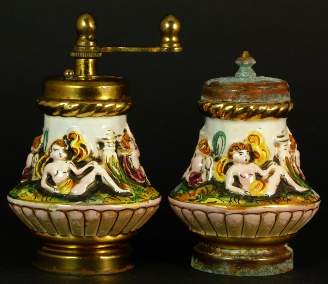 PAIR OF CAPODIMONTE SALT & PEPPER SHAKER IN RELIEF: Pair of capodimonte salt and pepper shakes in relief. Total approx weight 384g.