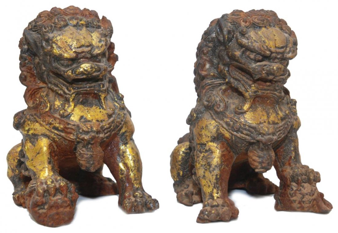 PAIR OF ANTIQUE CAST IRON FOO DOGS: Pair of antique cast iron foo dogs with remnants of original gold paint. Date to the early 20th century. Each measures approx 6" (15.24cm) Height. Total collective weight 4kg.