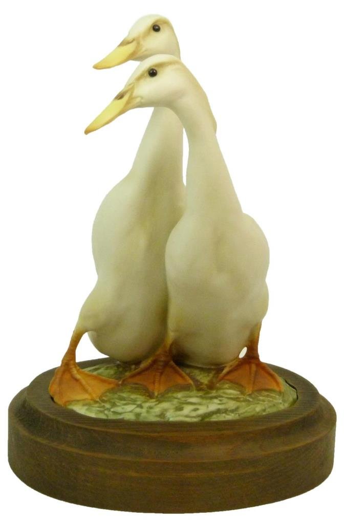 KAISER PORCELAIN GROUPING OF DUCKS: Signed Kaiser in blue to base. Comes with a fitted wooden base. Measures approx 8" (20.32cm) Tall. Total approx weight 720g.
