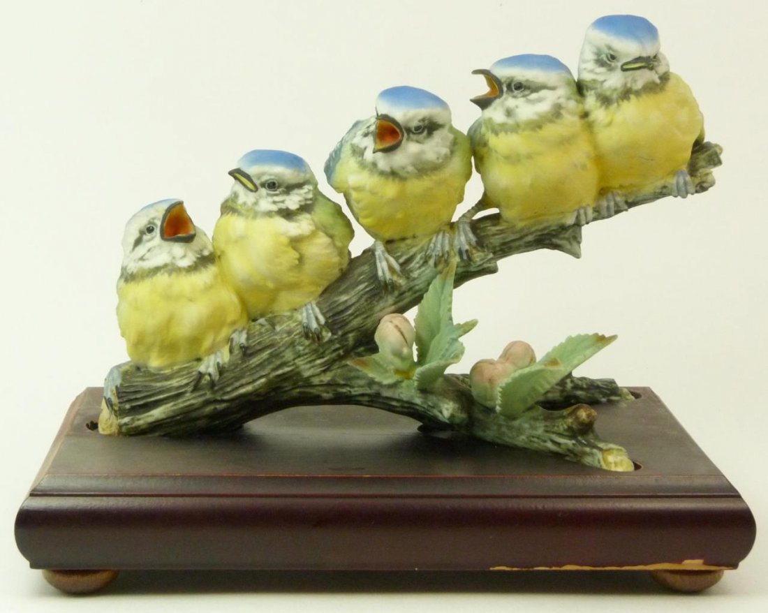 KAISER HAND PAINTED PORCELAIN CHICKS SCULPTURE: Depicting five chick on a branch. Comes with a fitted wooden base. Measures approx 9" (22.86cm) Long. Total approx weight 1.04kg.