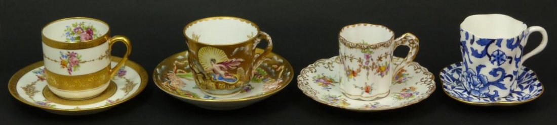 A LOT OF 4 CONTINENTAL HAND PAINTED CUPS & SAUCERS: Lot of four continental hand painted cups and saucers. One being a raised Capodimonte, an antique Coalport, an antique French Depose, and an antique Dresden. Total approx weight 600g.