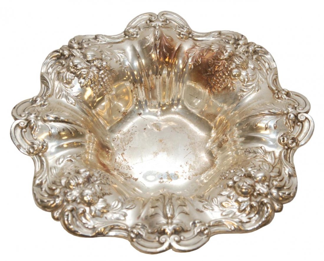 REED & BARTON FRANCIS I STERLING FOOTED BOWL: A mid 20th century Reed & Barton reticulated and footed bowl having a fruit design in the highly sought after 'Francis I' pattern. Bottom holding impressed maker's marks and numbered X569F. Has 1949 '