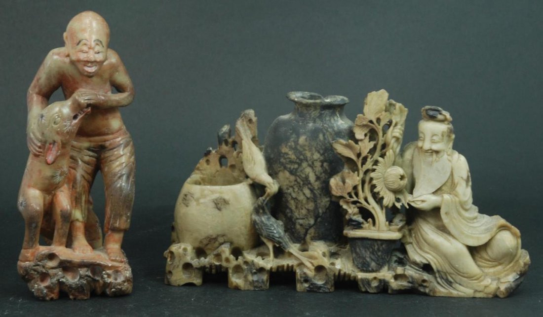 2 CHINESE CARVED SOAPSTONE CARVINGS: A lot of 2 Chinese carved soapstone items including a nicely carved figural vase and a man with dog. Tallest piece approx. 6 7/8" height (17.5cm). Total weight approx. 1.5 kilograms.