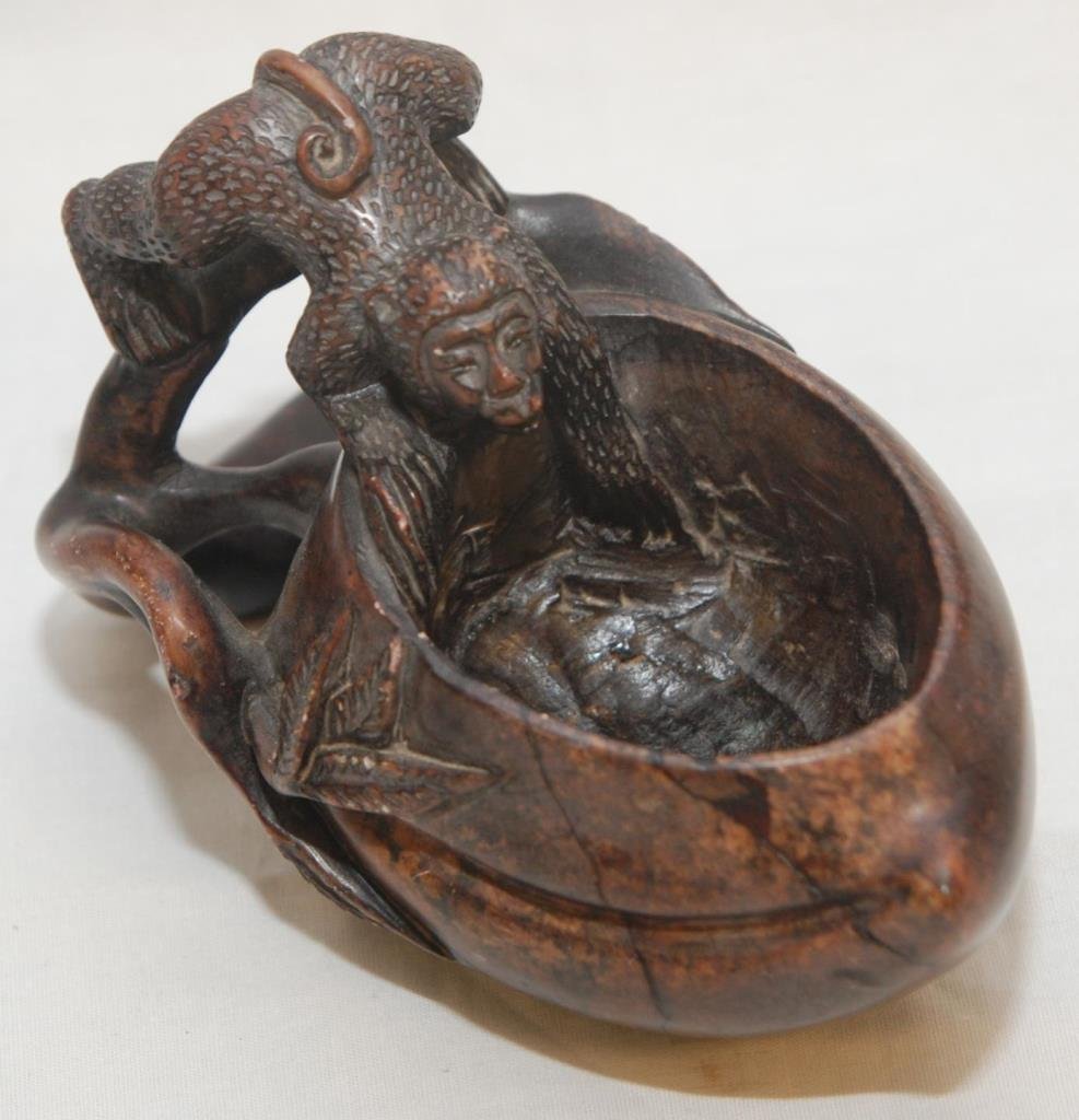 CHINESE SOAPSTONE MONKEY w PEACH WATER DROPPER: A Chinese carved soapstone scholar's desk water dropper having a figural monkey handle with branches and peach bowl. Measures approx. 3 7/8" height x 5" length x 3" depth (9.8cm x 12.7cm x 7.6cm). Tot