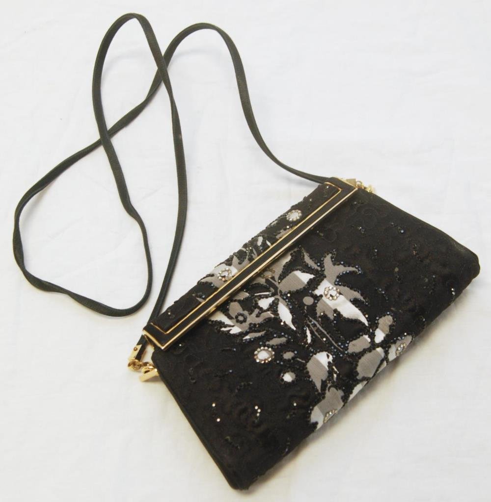 JUDITH LEIBER BLACK SILK BEADED EVENING BAG: Judith Leiber designer evening having a black silk jeweled design depicting flowers. Black silk interior with single open pocket. Gold tone hardware with hinged clasp. Detachable straps with 18 1/2" d