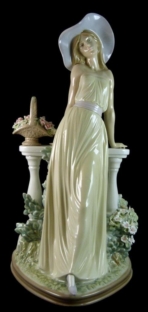 LLADRO SPANISH PORCELAIN FIG TIME FOR REFLECTION: Lladro Spanish porcelain sculpture depicting a woman leaning on a fence. Titled 'Time for Reflection' or 'Dama Reflexiva' number 5378. Sculpted by José Puche. Glazed finish. Issued in 1986. Measures 