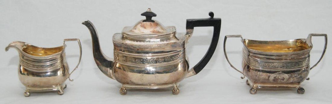 3pc 1808 ANNE & PETER BATEMAN GEORGE III TEA SET: A three piece early 19th century Anne & Peter Bateman English sterling silver George III tea set including teapot, creamer and sugar. Teapot with Ebonized wooden handle and finial. Teapot fully hallma