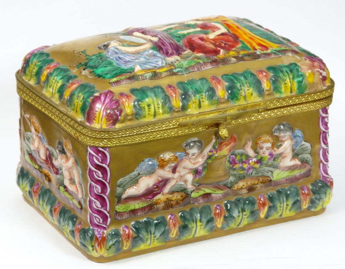 19th CAPODIMONTE PORCELAIN CHERUBS HINGES BOX: Antique Capodimonte Italian porcelain box depicting cherubs and classical scene. Hallmarked to bottom. Circa 19th century. Measures approx. 3 1/4" height x 5" width x 3 3/4" depth (8.3cm x 12.7cm x 9.