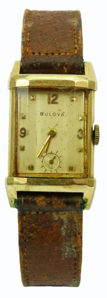 ANTIQUE BULOVA 14KT YELLOW GOLD MEN'S WATCH: Antique Bulova 14kt yellow gold men's watch. Circa 1950s. Marked to case Bulova serial number 8378739. Total approx weight 27 1/2g.