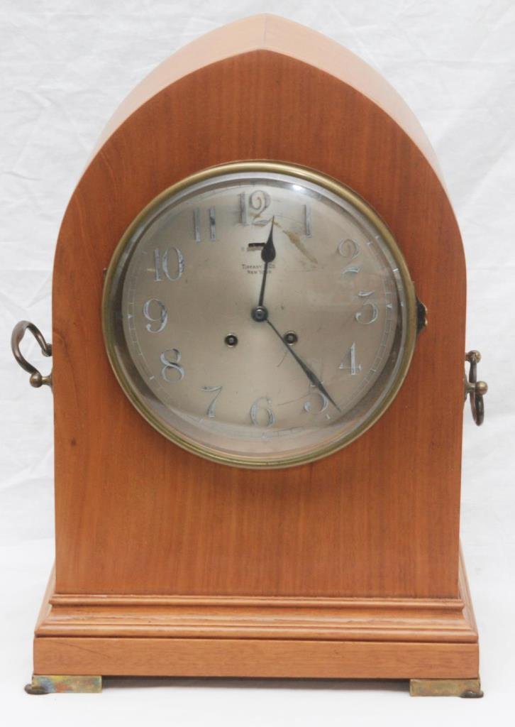 LARGE TIFFANY & CO. BEE HIVE WOODEN MANTEL CLOCK: A large Tiffany & Company, New York bee hive case clock having a Chelsea Clock Company movement #133355. Inlay band design throughout. Brass handles to sides. Measures approx. 17 7/8" height x 12 1/2"