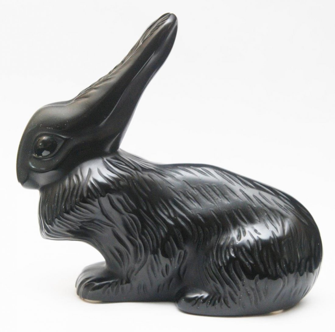 LALIQUE BLACK CRYSTAL 'CESAR' RABBIT SCULPTURE: Lalique French black crystal 'Cesar' rabbit sculpture. Etched script 'Lalique France' mark to bottom. Measures approx. 4 1/4" height (10.8cm). Total weight approx. 825 grams.