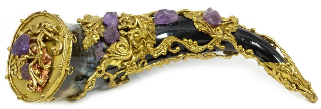 OX HORN OVERLAID WITH GILT METAL & AMETHYST: Beautiful hand made decorative ox horn adorned with gilt metal framing and amethyst gemstones. Marked 'Made in Brazil'. Measures approx. 13 3/4" length (35cm). Total weight approx. 849 grams.