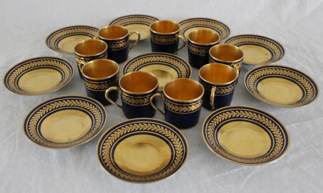 9 B&Co LIMOGES PORCELAIN DEMITASSE & SAUCER SETS: A set of 9 L. Bernardaud & Company Limoges French porcelain demitasse cup and saucer sets. Each with cobalt ground and gilt accenting throughout. Includes 9 demitasse cups and 10 saucers. 19 total pie