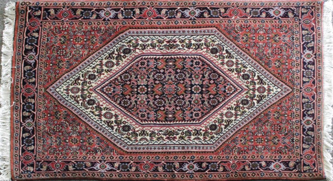 PERSIAN WOVEN WOOD RED GROUND RUG (1 of 6)