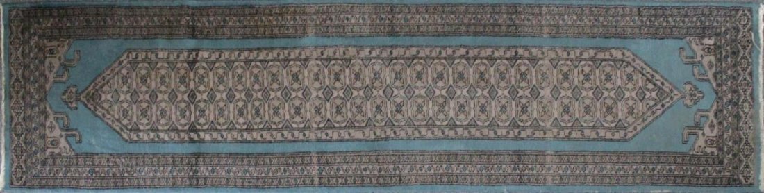 PERSIAN TURQOUISE GROUND RUNNER RUG 8' x 2': Persian wool rug with turquoise ground. Measures approx. 97" length x 25" width (246cm x 64cm).