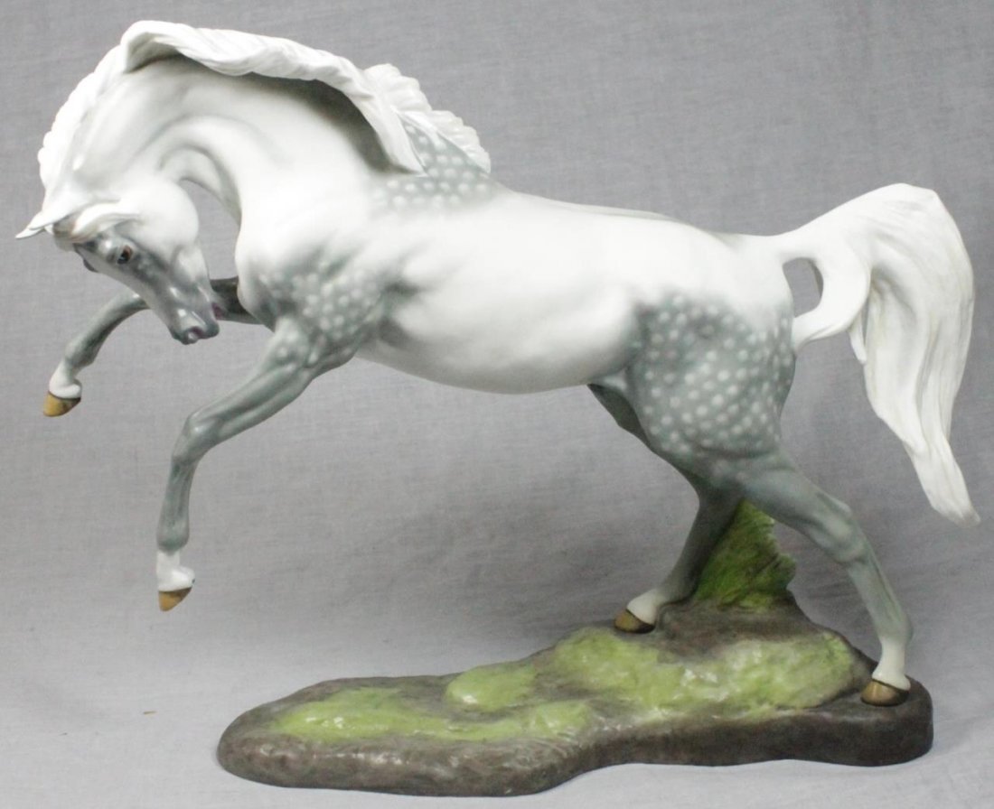 BOEHM PORCELAIN 'ARABIAN STALLION' FIGURE 55007: Boehm 1983 porcelain equestrian sculpture depicting a bucking 'Arabian Stallion' number 55007. Limited Edition number 116. Measures approx. 12" height x 15" length (30cm x 38cm). Total weight approx. 