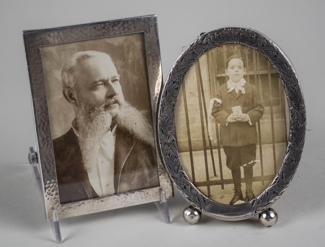Two Sterling Silver Picture Frames: One hammered finish rectangular picture frame, holds 3 x 5 photo; the other oval with ball feet, holds, 3 1/2 x 5 photo. Notice to bidders: Condition reports and additional photographs are provided by