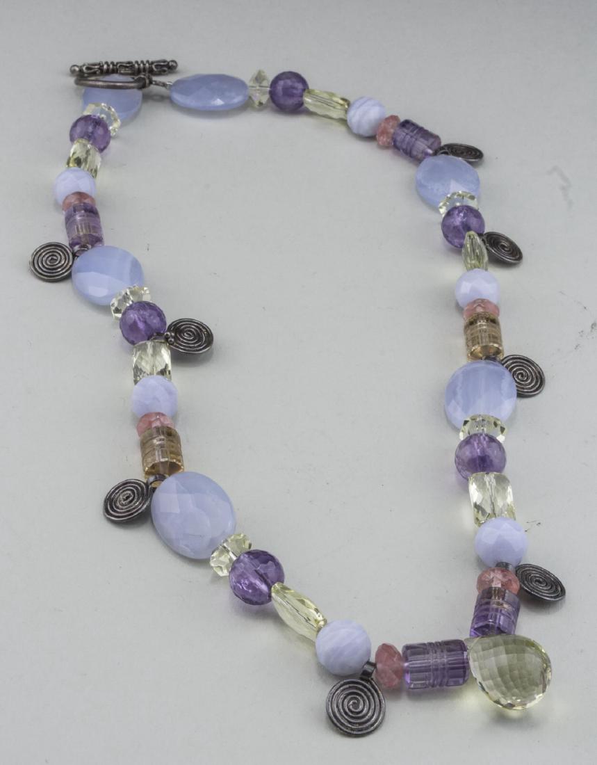 Gemstone Bead Necklace: Single strand necklace with chalcedony, lemon quartz, amethyst, blue lace agate, pink quartz and ametrine beads, finished with a sterling silver clasp. Length 18 inches. Notice to bidders: Condition r
