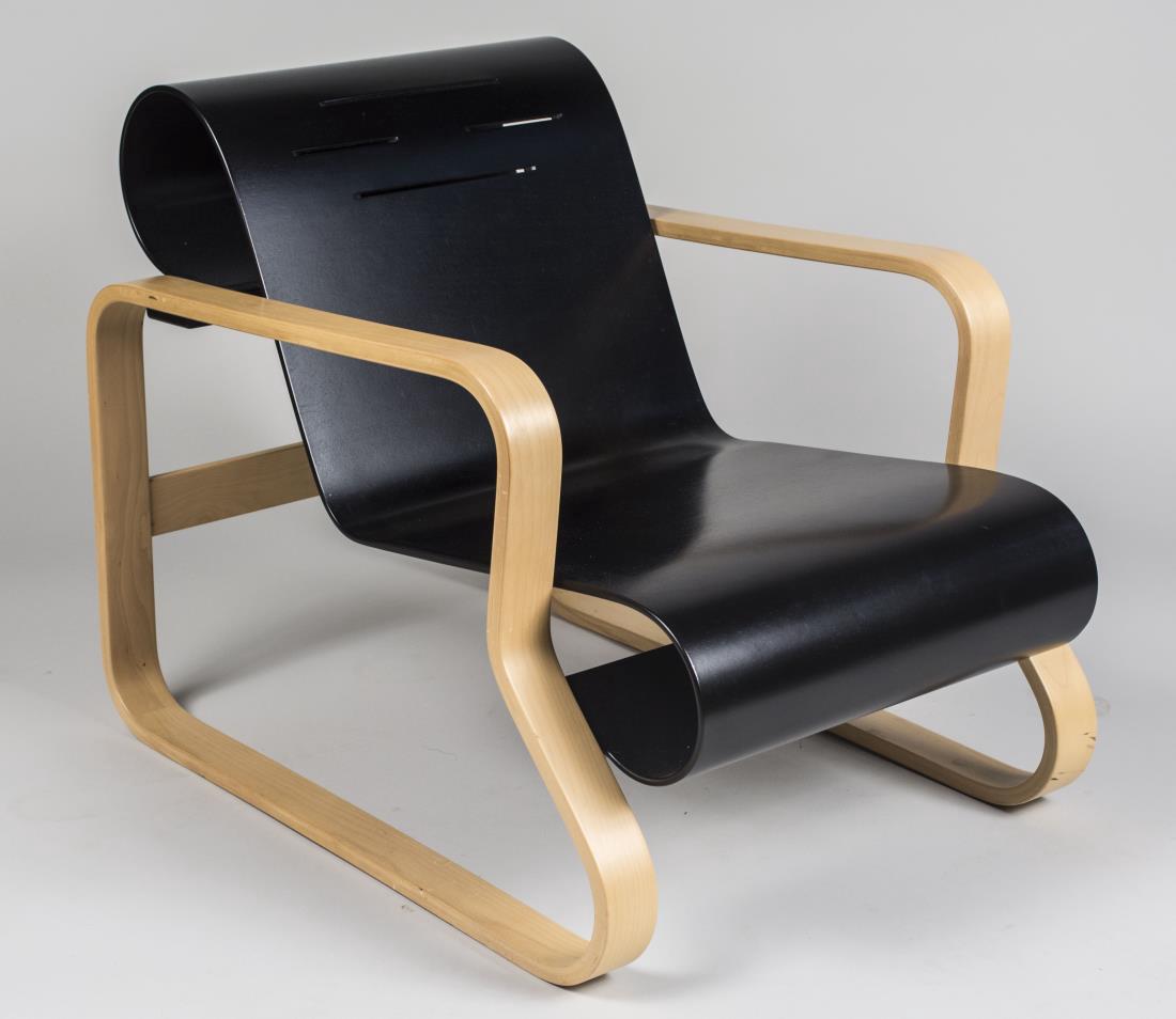 Alvar Aalto Paimio Armchair *: By Artek, also known as Chair 41, black lacquered bentwood back and seat, on a bent birch frame. Height 25 1/4 inches, width 23 3/4 inches, depth 31 1/2 inches. Notice to bidders: Condition reports an